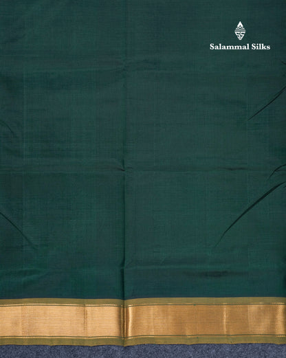 Bottle Green Plain Pure Silk Cotton Saree With Contrast Manthulir Yellow Blouse