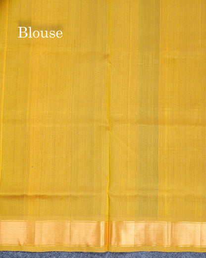 Bottle Green Plain Pure Silk Cotton Saree With Contrast Manthulir Yellow Blouse
