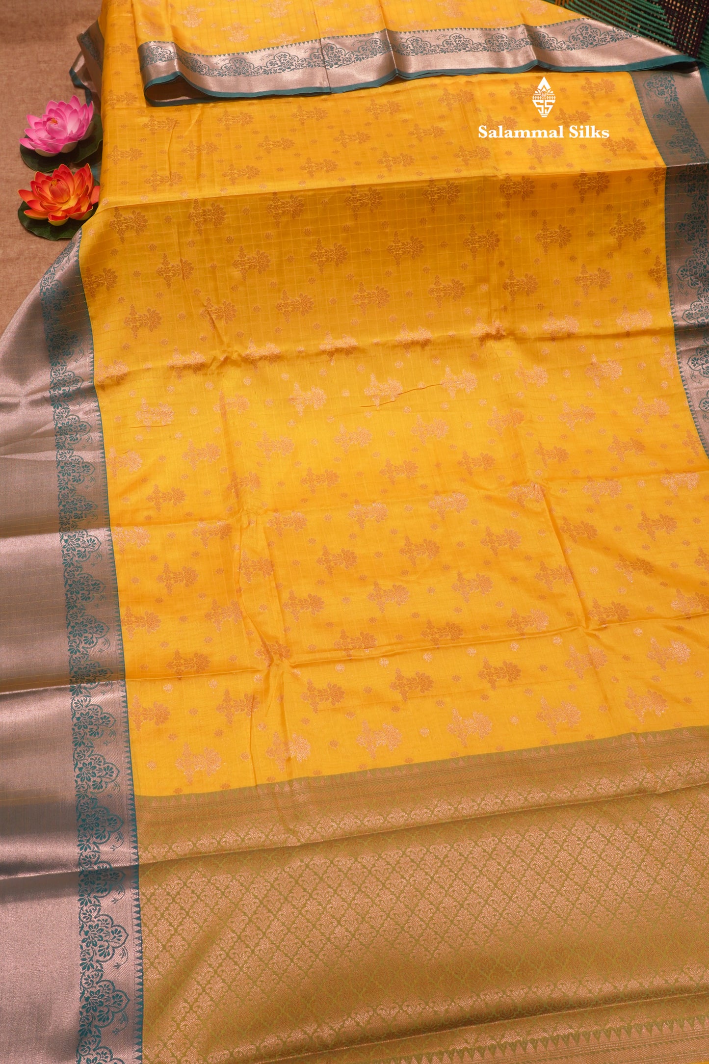 Yellow Colour Fancy Saree With Contrast Sapphire Green Border