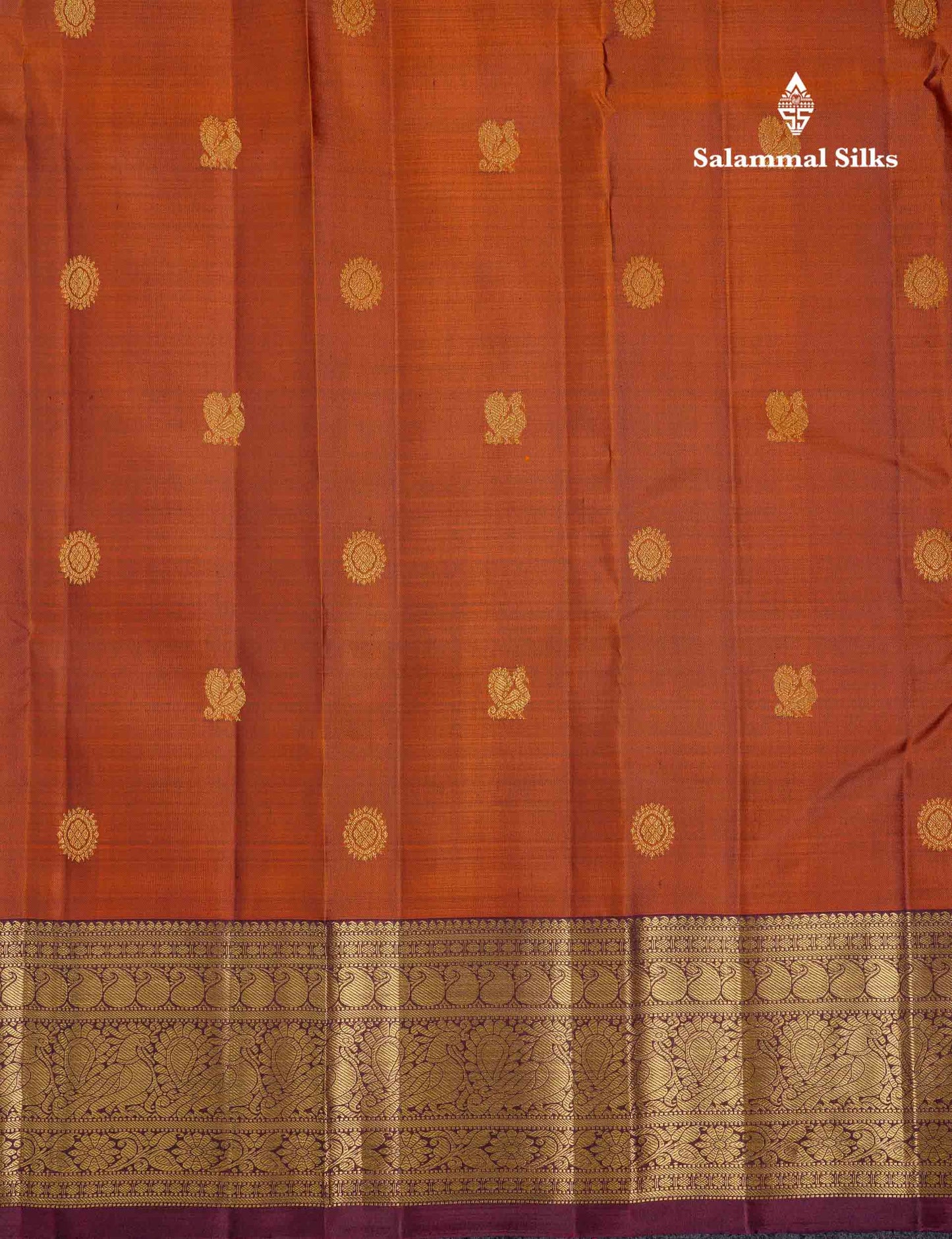 Beautiful Rust Orange Chakaram & Peacock Butta Pure Kanjivaram Silk Saree With Contrast Dark Brown Traditional Border