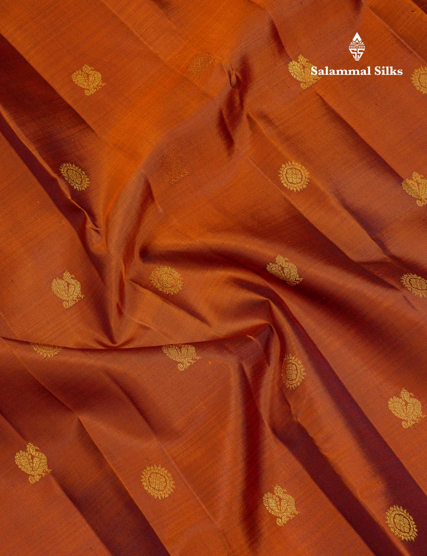 Beautiful Rust Orange Chakaram & Peacock Butta Pure Kanjivaram Silk Saree With Contrast Dark Brown Traditional Border