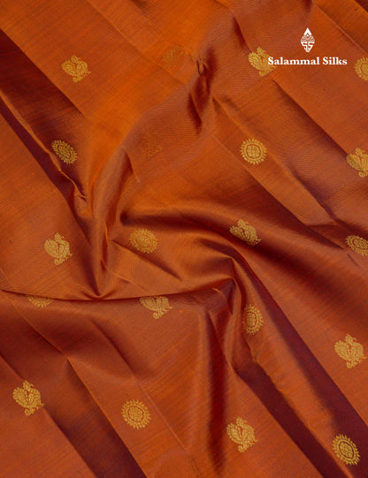 Beautiful Rust Orange Chakaram & Peacock Butta Pure Kanjivaram Silk Saree With Contrast Dark Brown Traditional Border