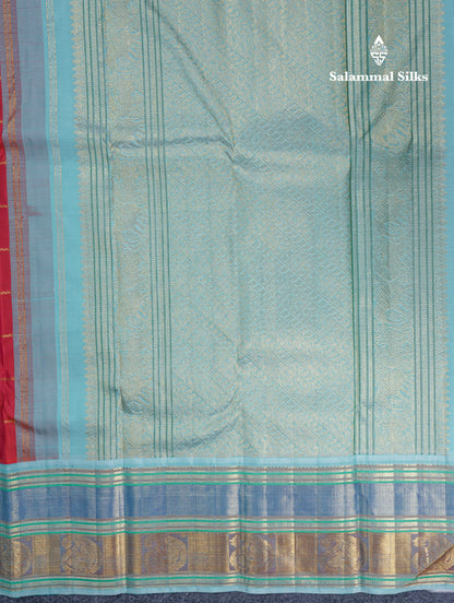 Reddish Orange Veldhari Checks Pure Kanjivaram Silk Saree With Contrast Sky Blue Traditional Border