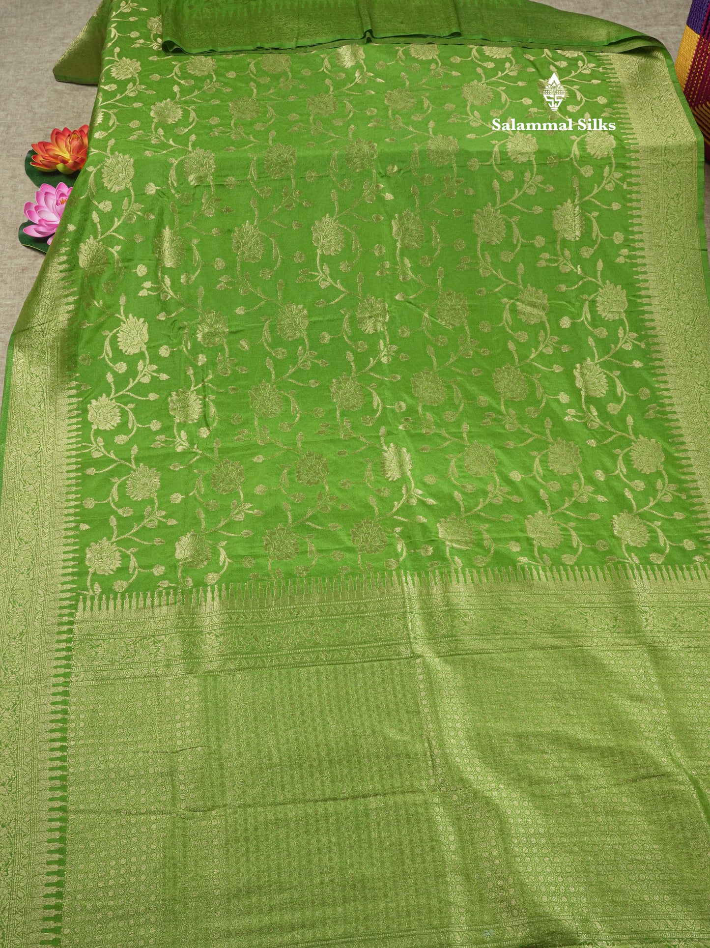 Bottle Green Semi Georgette Saree With Fancy Self Border