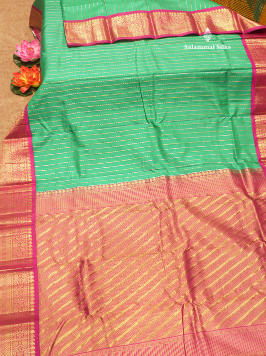 Saffire Green Colour Pure Kanjivaram Silk Saree With Contrast Magenta Border