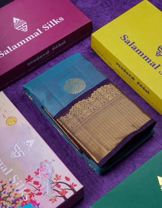 Beautiful Dual Tone Peacock Blue Puremix Silk Saree With Contrast Dark Magenta Traditional Border