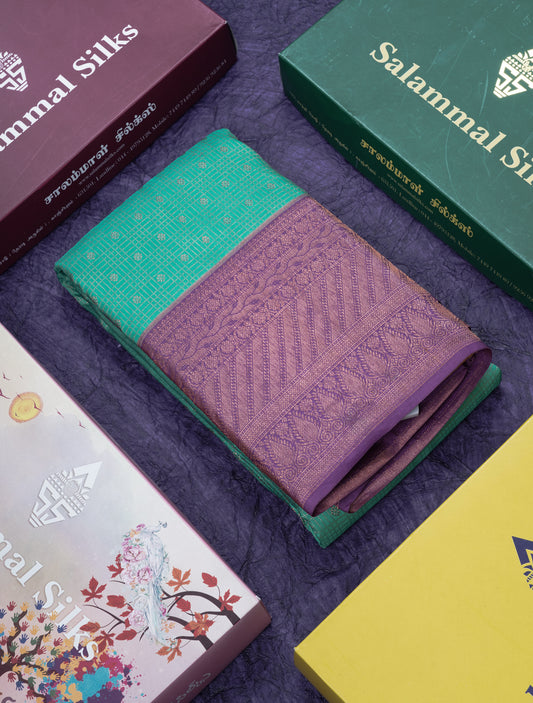 Sapphire Green Pure Kanjivaram Silk Saree with Contrast Purple Border