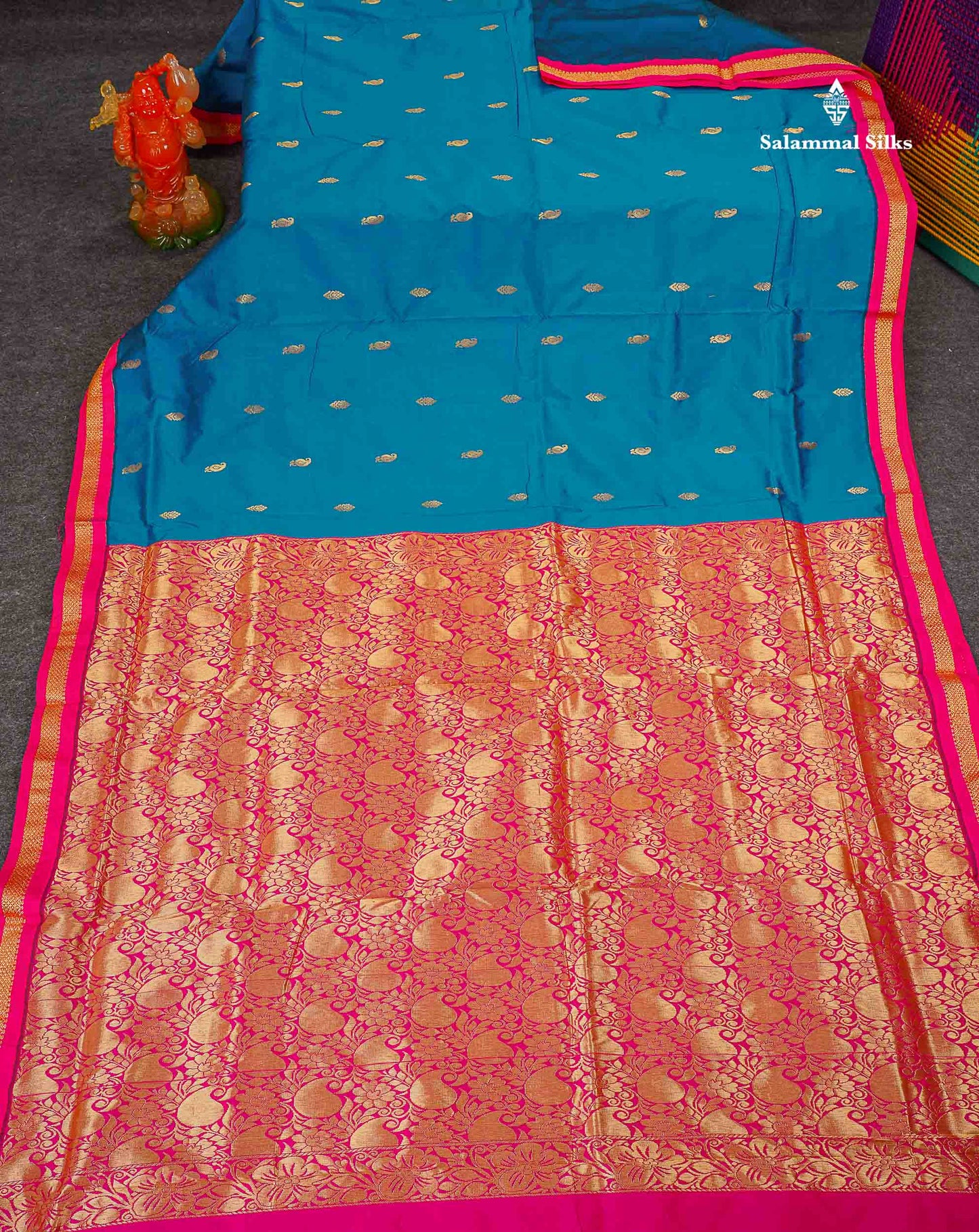 Semi Silk Saree - Peacock Blue Colour Body Zari Buttas With Contrast Pink Small Border | 10 Yards