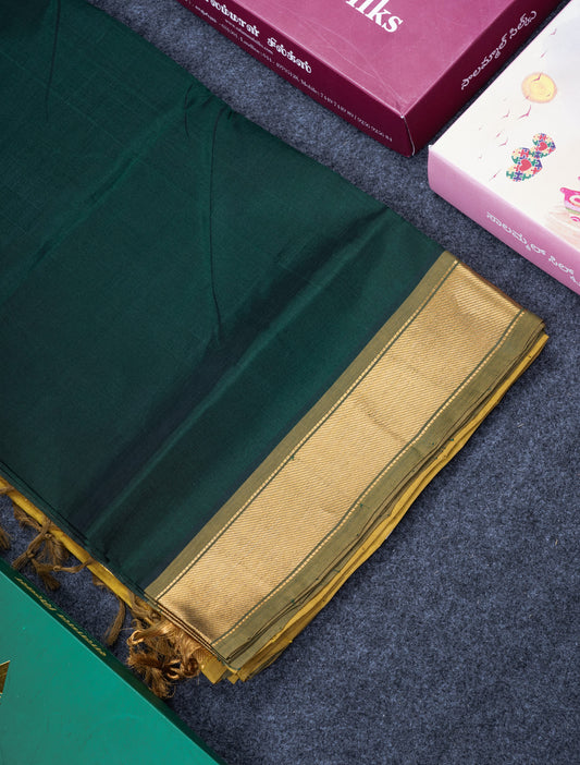 Bottle Green Plain Pure Silk Cotton Saree With Contrast Manthulir Yellow Blouse