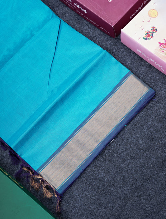 Aanada Blue Plain Pure Silk Cotton Saree With Contrast Violet Blouse