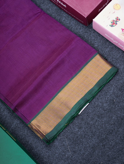 Dark Purple Plain Pure Silk Cotton Saree With Contrast Bottle Green Blouse