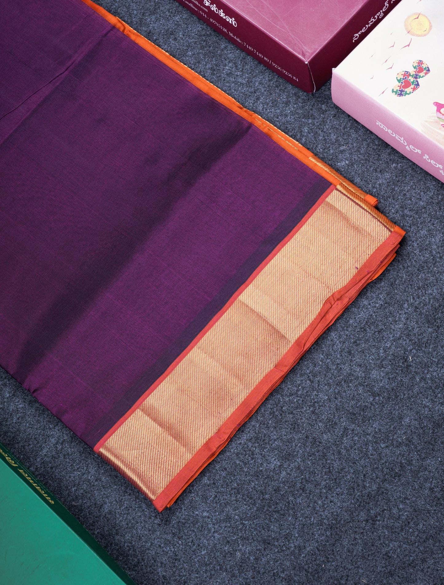 Dark Purple Plain Pure Silk Cotton Saree With Contrast Orange Blouse