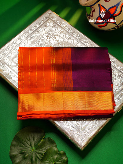 Dark Purple Plain Pure Silk Cotton Saree With Contrast Orange Blouse