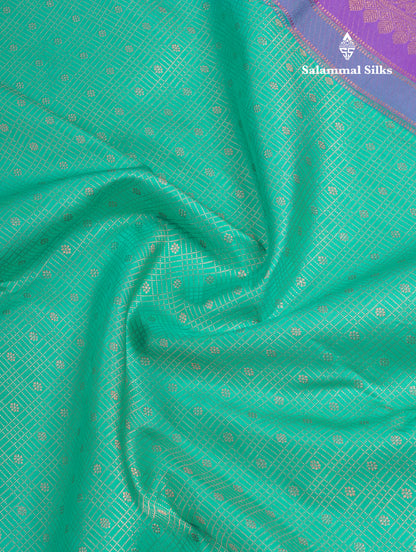 Sapphire Green Pure Kanjivaram Silk Saree with Contrast Purple Border