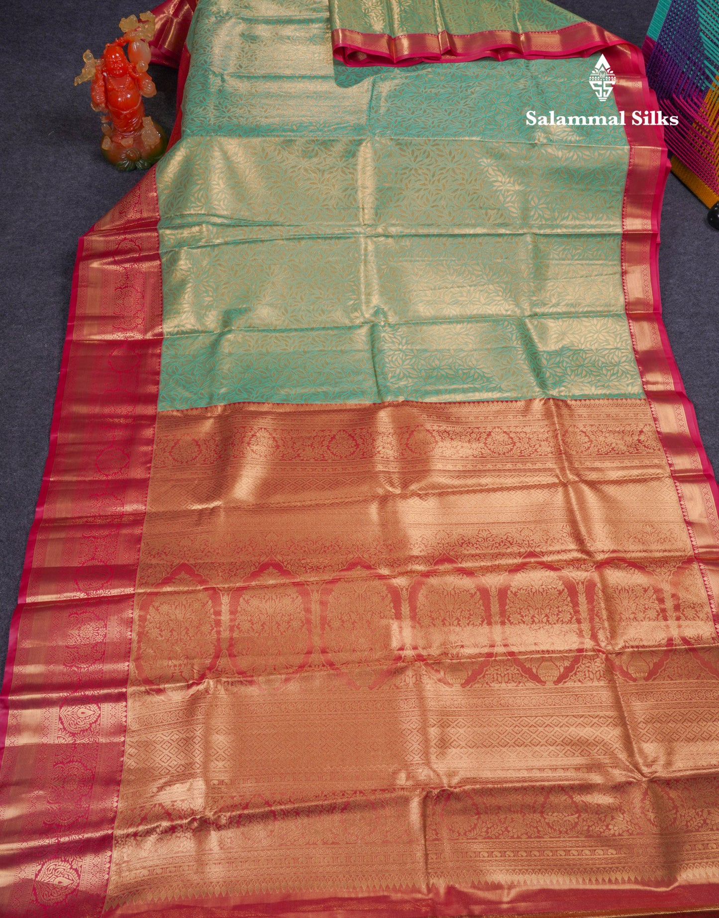 Beautiful Light Rexona Green Tissue Semi Silk Saree With Contrast Pink Border