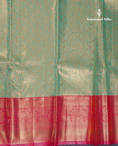 Beautiful Light Rexona Green Tissue Semi Silk Saree With Contrast Pink Border