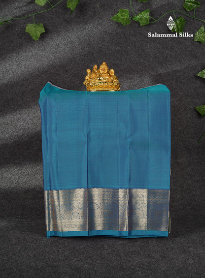 Beautiful Zari Checks With Annam And Chakaram Butta Pure Silk Pattu Pavadai (Sapphire Green) With Contrast Violet Traditional Blouse 18"