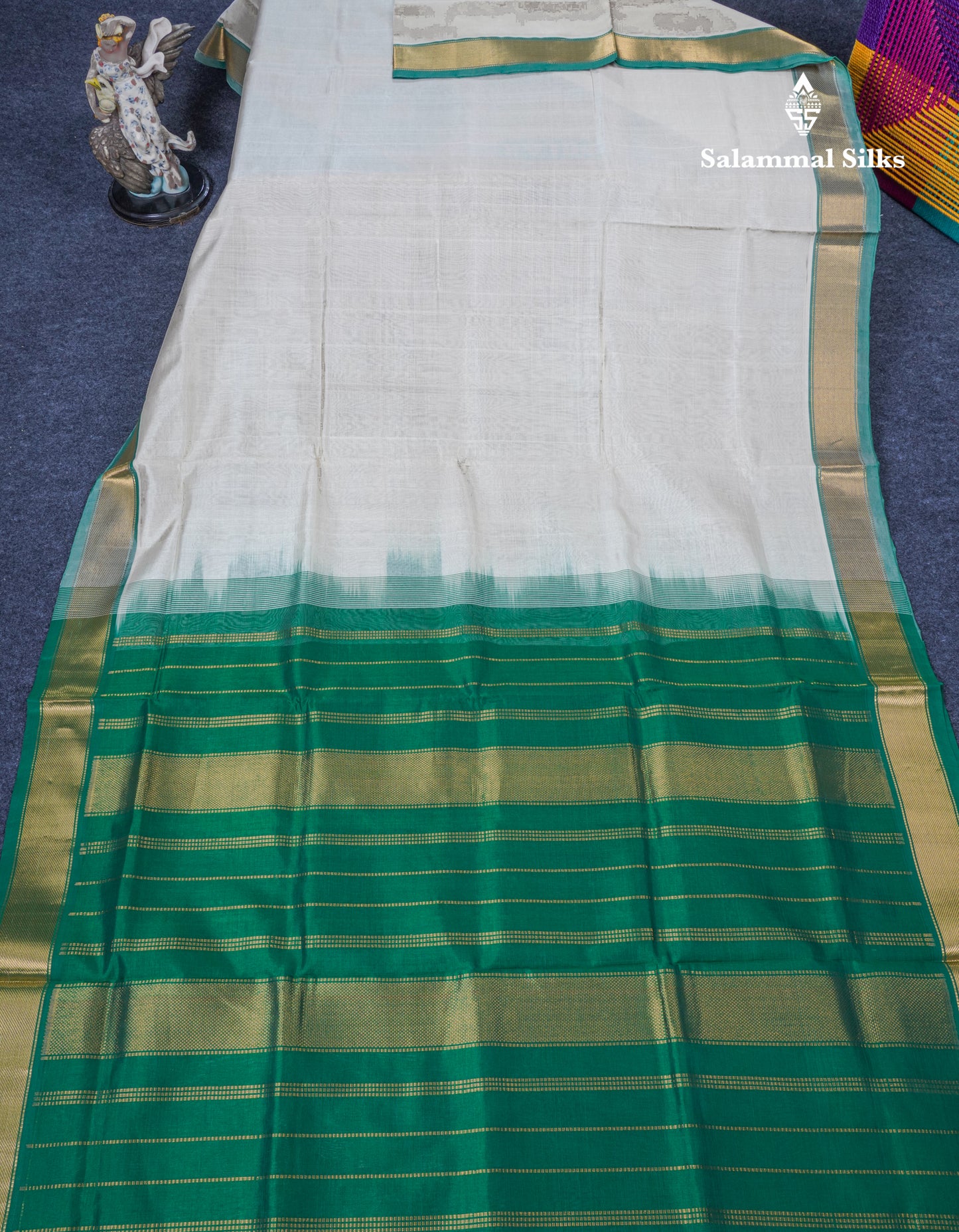 Half White Plain Pure Silk Cotton Saree With Contrast Bottle Green Blouse