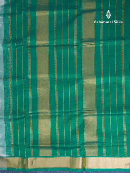 Half White Plain Pure Silk Cotton Saree With Contrast Bottle Green Blouse