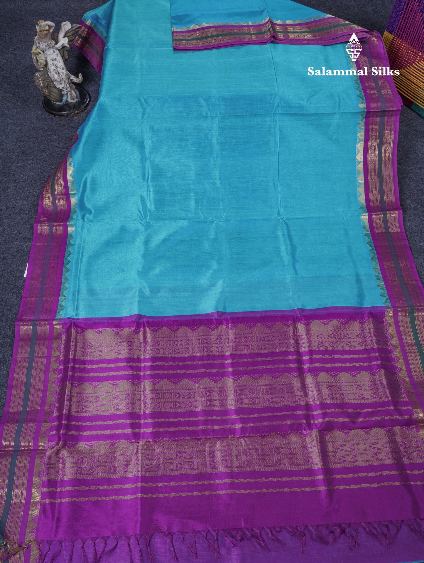 Sky Blue Plain Pure Silk Cotton Saree With Contrast Purple Traditional Border