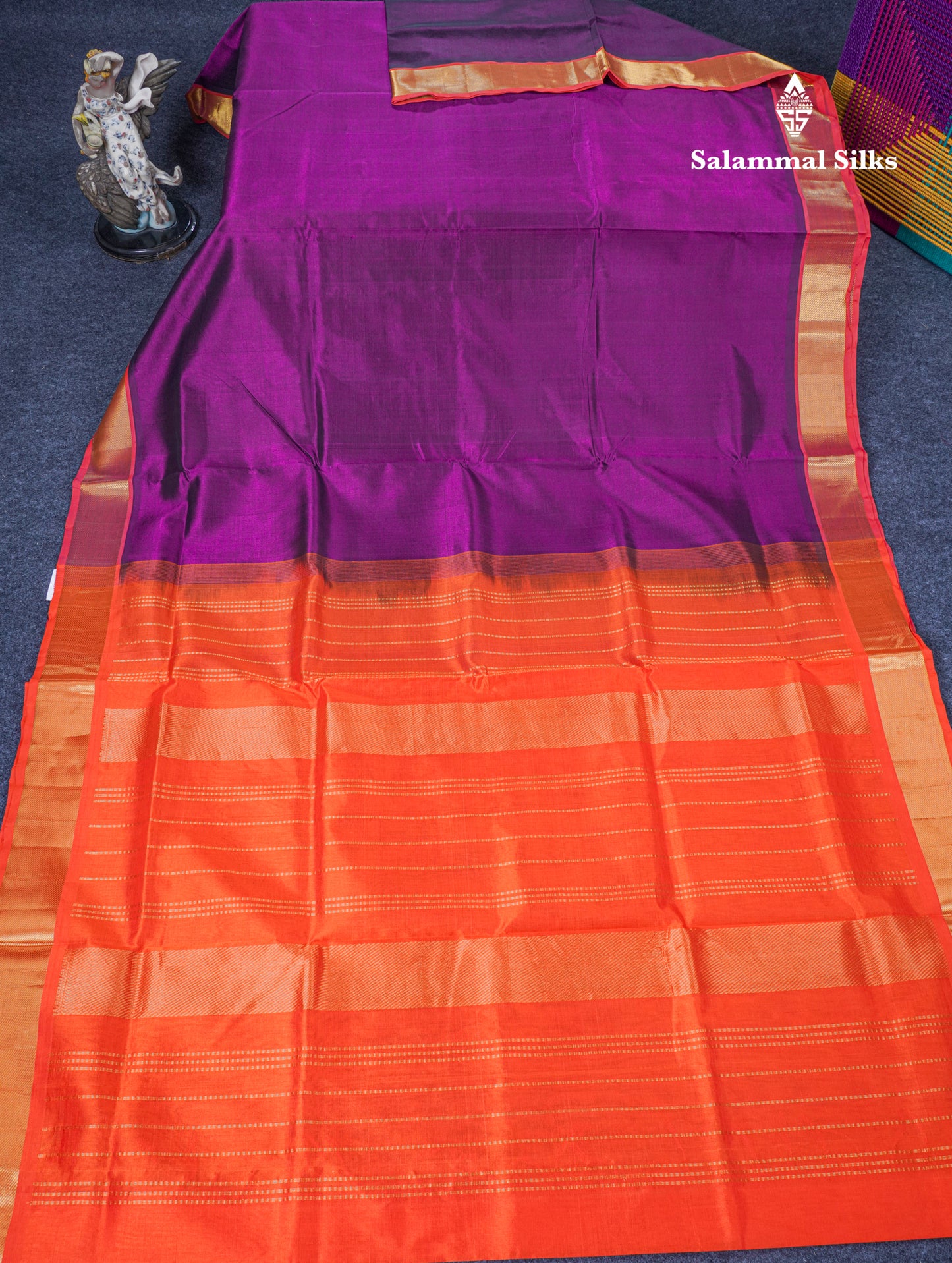 Dark Purple Plain Pure Silk Cotton Saree With Contrast Orange Blouse