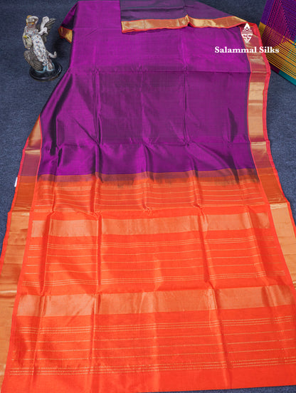 Dark Purple Plain Pure Silk Cotton Saree With Contrast Orange Blouse