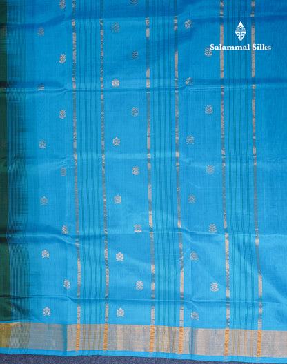 Bottle Green Pure Silk Cotton Saree With Contrast Sky Blue Blouse