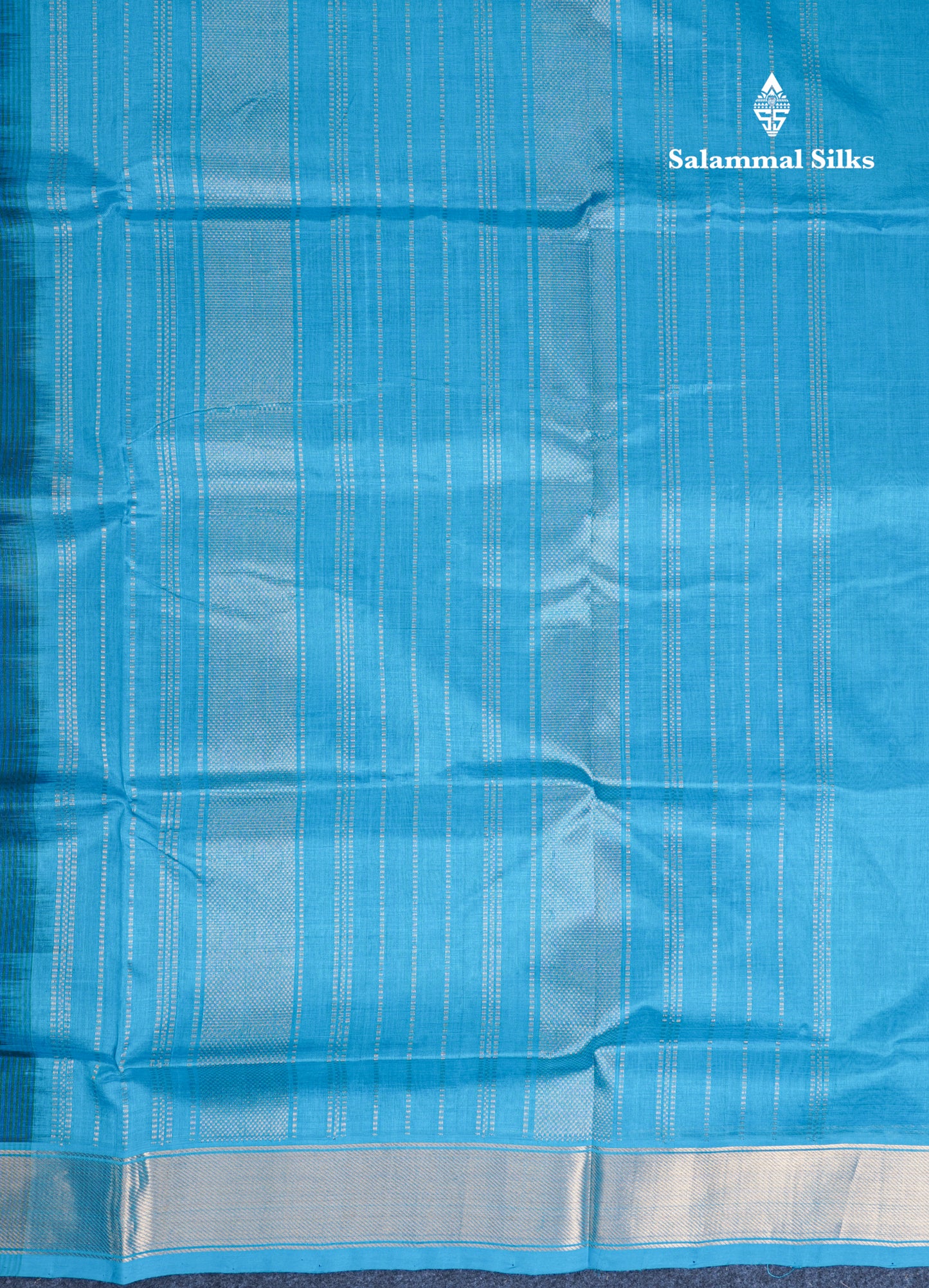 Bottle Green Plain Pure Silk Cotton Saree With Contrast Sky Blue Blouse