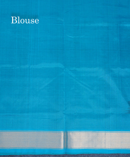 Bottle Green Plain Pure Silk Cotton Saree With Contrast Sky Blue Blouse