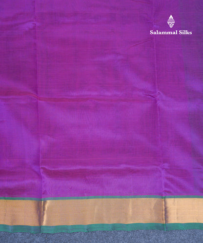 Dark Purple Plain Pure Silk Cotton Saree With Contrast Bottle Green Blouse