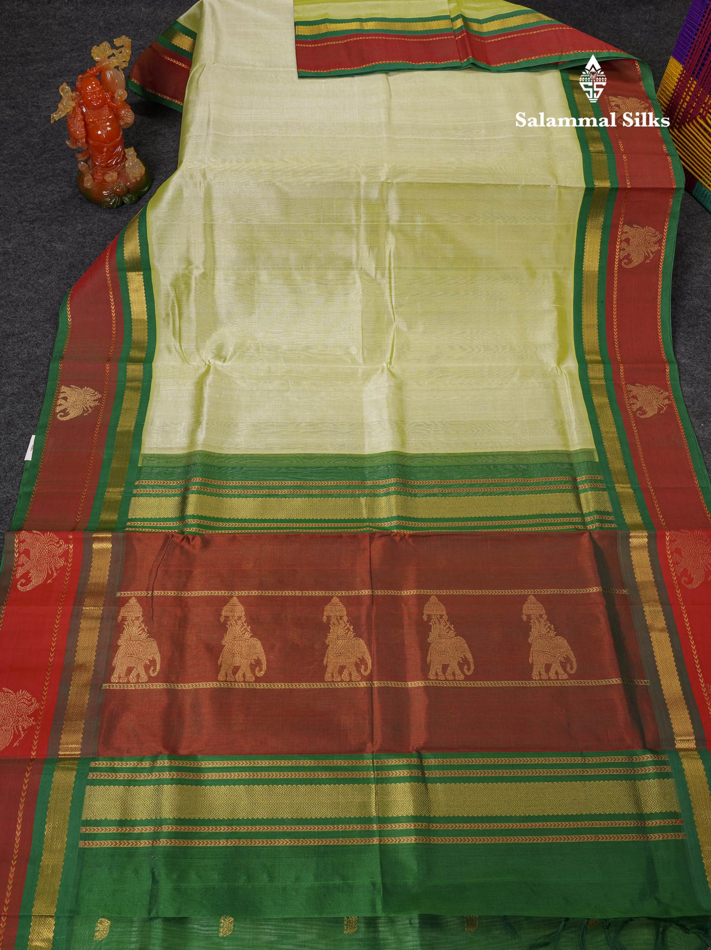 Beautiful Light Pista Green Plain Pure Silk Cotton Saree With Dual Tone Maroon Traditional Border