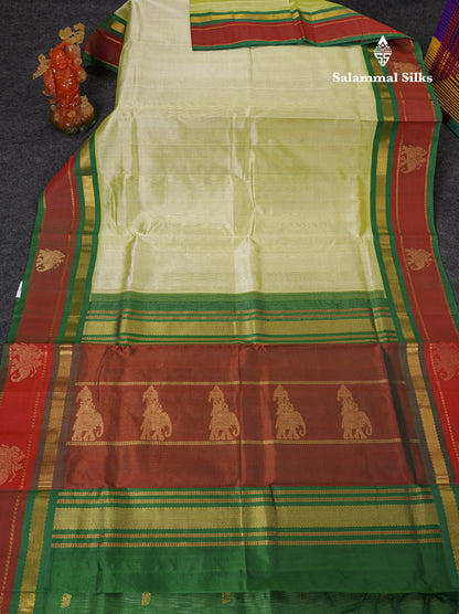 Beautiful Light Pista Green Plain Pure Silk Cotton Saree With Dual Tone Maroon Traditional Border