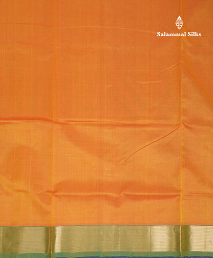 Mango Yellow Plain Pure Silk Cotton Saree With Contrast Bottle Green Blouse