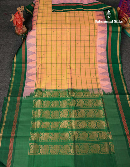 Beautiful Dual Tone Pinkish Peach Checks With Butta Silk Cotton Saree With Contrast Bottle Green Traditional Temple & Gap Border