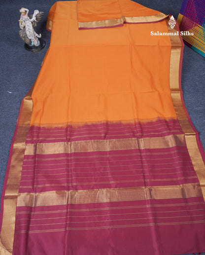Mustard Yellow Plain Semi Silk Cotton Saree With Contrast Dark Maroon Blouse
