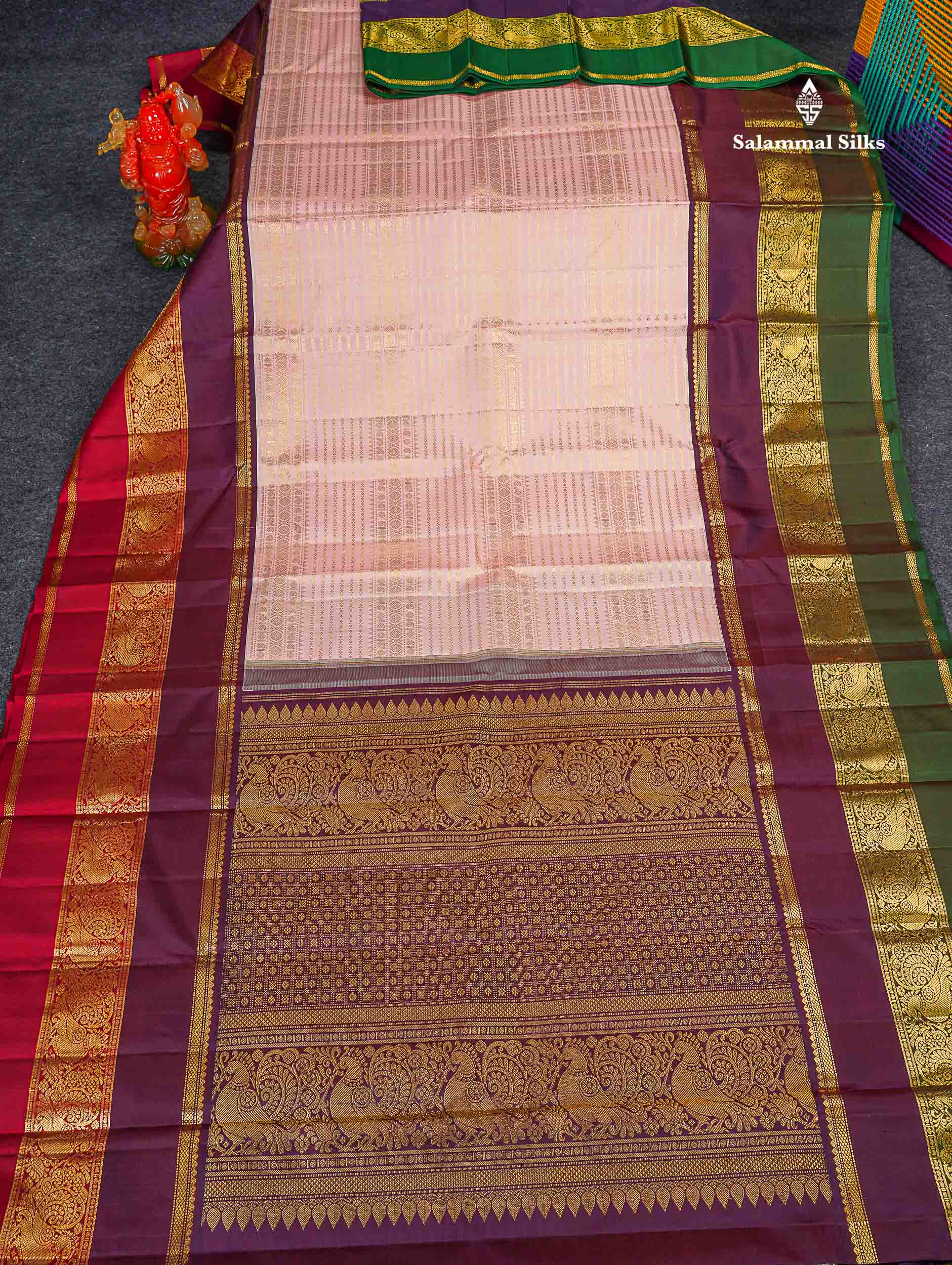 Korvai Pure Kanjivaram Silk Saree - Light Peach Colour Body With Contrast Dark Purple Traditional Ganga Jamuna Border
