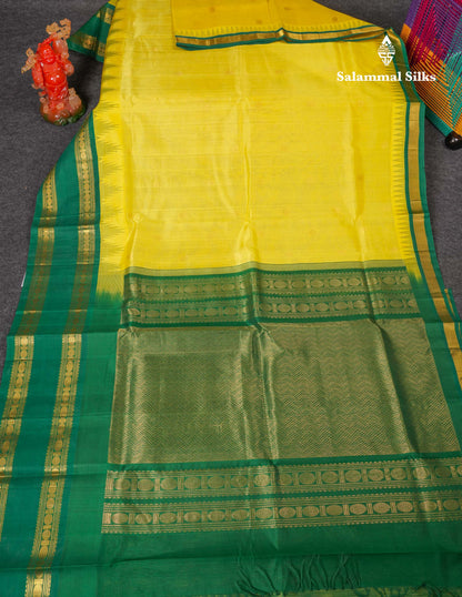 Beautiful Lemon Yellow Zari Butta Pure Silk Cotton Saree With Contrast Saffire Green Traditional Gap Border