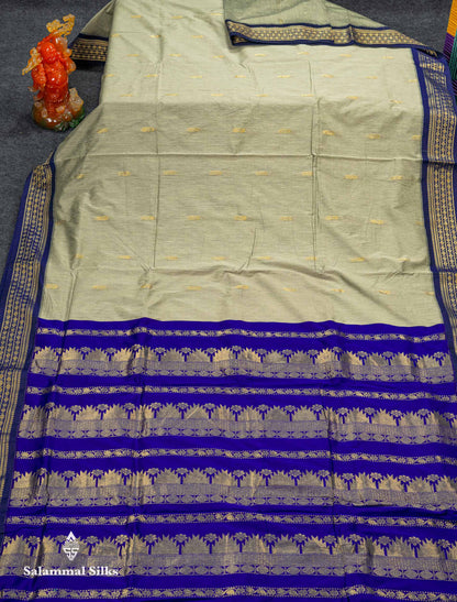 Beautiful Light Parrot Green Zari Butta Kalyani Cotton Saree With Contrast Navy Blue Traditional Border