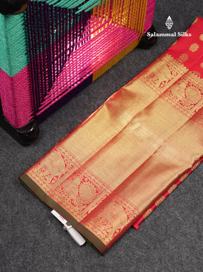 Beautiful Pure Silk Pattu Pavadai (Dual Tone Pinkish Orange) With Traditional Long Border 45"