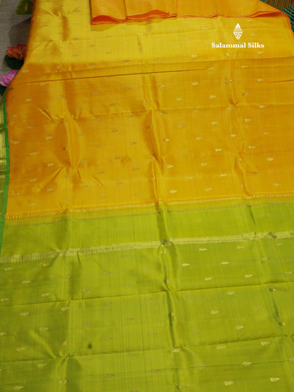 Mango Yellow Pure Kanjivaram Silk Saree With One Side Contrast Parrot Green Border