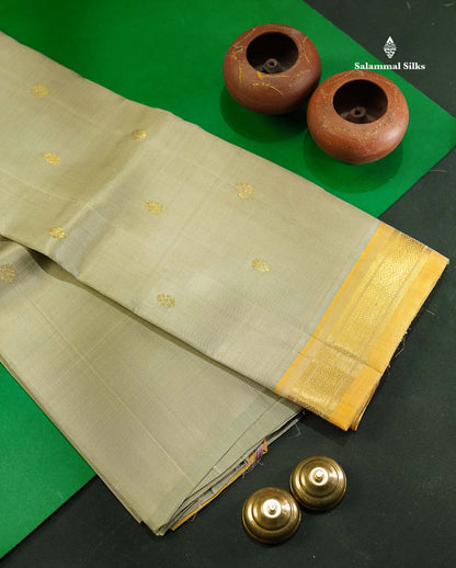 One Side Border Pure Silk Saree - Beige Colour Zari Butta With Contrast Mustard Yellow Small Border