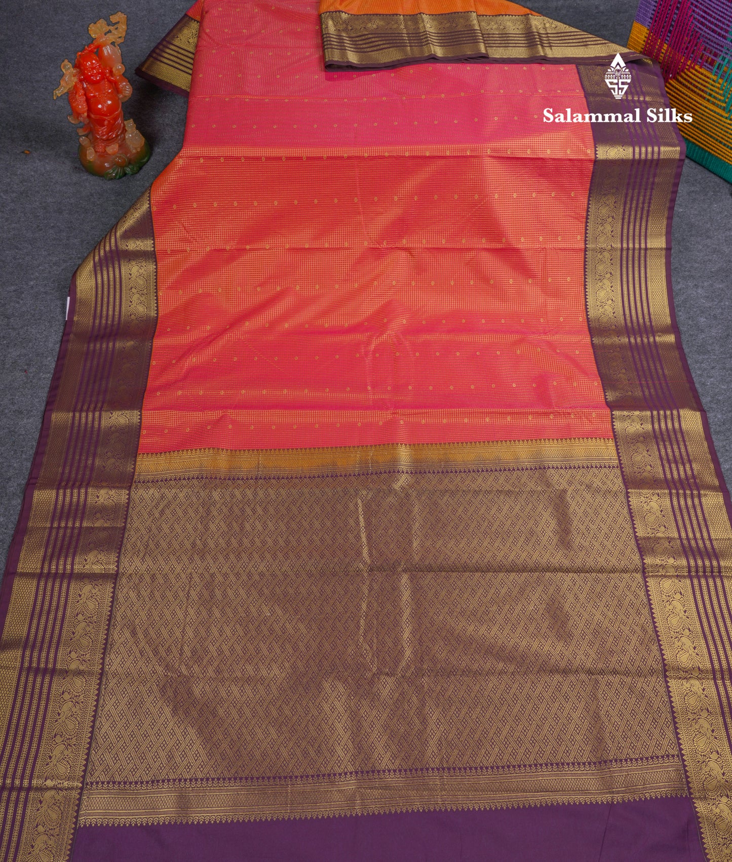 Beautiful Dual Tone Pinkish Orange Semi Silk Saree With Contrast Dark Violet Traditional Border