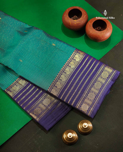 Pure Kanjivaram Silk Saree - Petrol Blue Colour Body Vertical Lines With Butta & Navy Blue Traditional Border