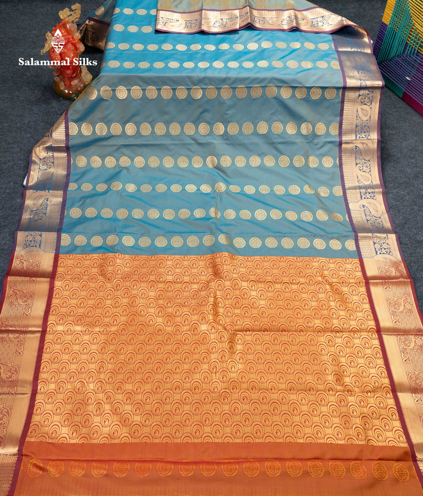 Beautiful Pastel Blue Zari Butta Semi Silk Saree With Contrast Magenta Traditional Border