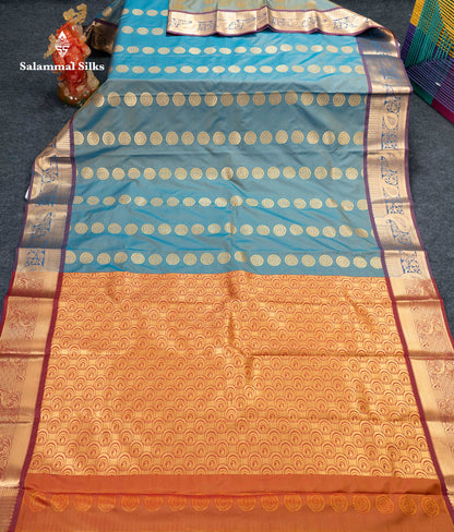 Beautiful Pastel Blue Zari Butta Semi Silk Saree With Contrast Magenta Traditional Border
