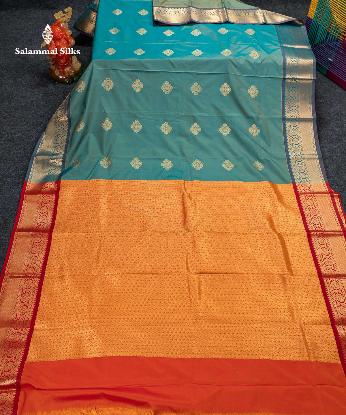 Beautiful Dual Tone Sapphire Green Zari Butta Semi Silk Saree With Contrast Orange Blouse