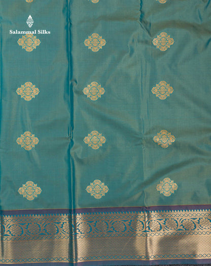 Beautiful Dual Tone Sapphire Green Zari Butta Semi Silk Saree With Contrast Orange Blouse
