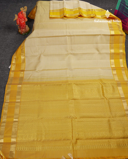 Beautiful Cream Sandal Lines Pure Kanjivaram Silk Saree With Contrast Mustard Yellow Traditional Rettapet Border
