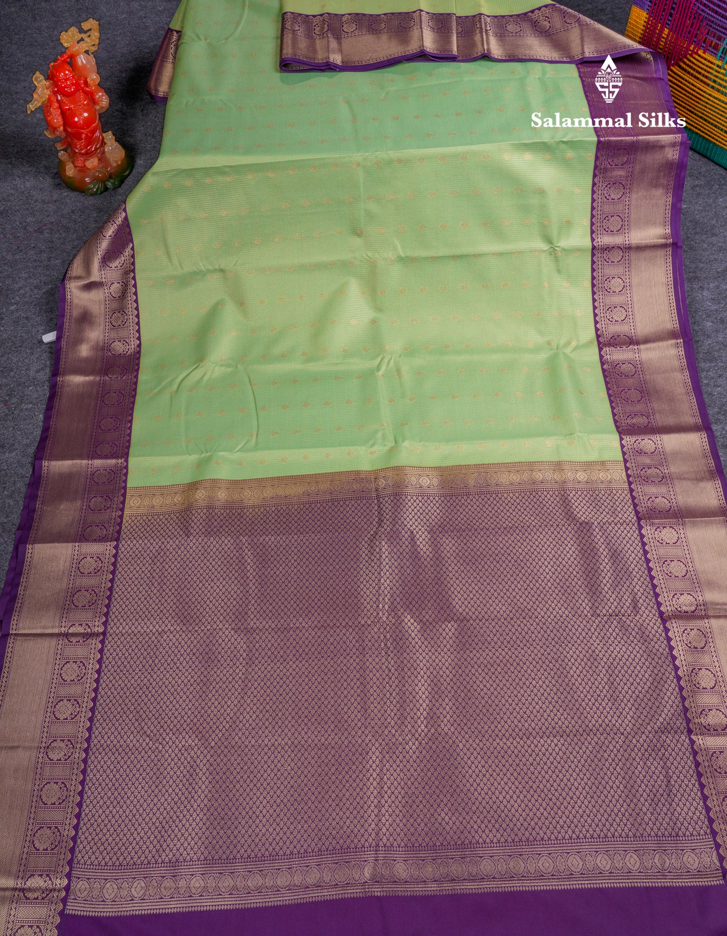 Beautiful Pista Green Vaira Oosi Checks With Butta Semi Silk Saree With Contrast Dark Violet Border