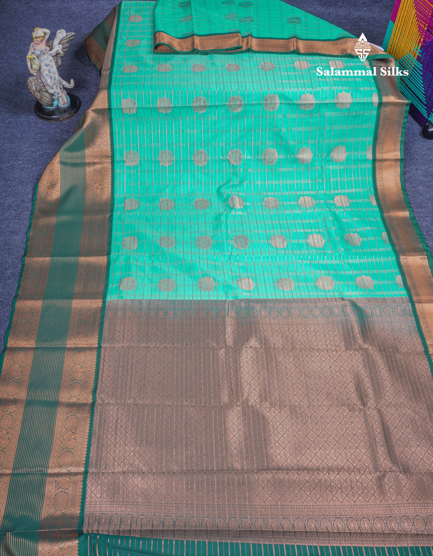 Rexona Green Semi Silk Saree With Contrast Long Traditional Bottle Green Border